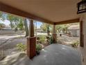 Spacious covered front porch with brick column bases, providing a relaxing outdoor space at 829 N Lake Ave, Lakeland, FL 33801
