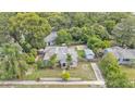 Inviting home with a detached garage and mature trees, set on a well-sized lot at 1020 E Palmetto St, Lakeland, FL 33801