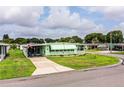 Inviting single-story home with a well-manicured lawn and convenient street access at 1610 Reynolds Rd # 204, Lakeland, FL 33801