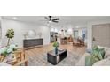 Open-concept living space with seamless flow between living, dining, and kitchen areas at 1920 Kimball S Ct, Lakeland, FL 33813