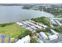 Aerial view of a lakeside community with well-maintained homes, mature trees, and beautiful lake views at 2203 Starboard, Winter Haven, FL 33881