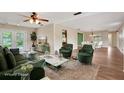 Staged living room showcasing a modern, open-concept design with elegant furnishings and ample natural light at 2632 Handley Blvd, Lakeland, FL 33803