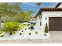 Charming home featuring a terracotta roof, a brick driveway, and a well-manicured landscaped yard at 11761 Bella Milano Ct, Windermere, FL 34786
