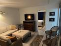 A comfortable living room with access to the bedroom and stylish decor at 1100 Martinique Dr # 203, Winter Haven, FL 33884