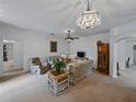 Comfortable living room with plush seating and ample natural light, creating a cozy atmosphere at 3427 Waterlute Way, Lakeland, FL 33811