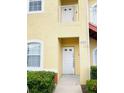 Close-up view of the unit entrance with a white door and visible unit number, 4102 at 4102 Lake Marion Golf Resort # 4102, Kissimmee, FL 34759