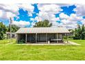 Large metal garage perfect for storing machinery, vehicles, and other equipment at 10 Webb Rd, Winter Haven, FL 33881