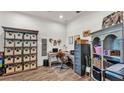 The home office features natural light, and built-in storage with a work desk at 1028 15Th Ne St, Winter Haven, FL 33881