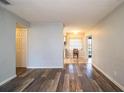 Bright and airy living room showcasing modern flooring at 1604 Park Dr, Lakeland, FL 33803