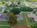 This aerial shot showcases the home's spacious lot and the surrounding neighborhood at 2714 Highlands Vue Pkwy, Lakeland, FL 33813