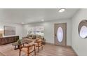 Comfortable living room featuring neutral decor, contemporary furnishings, and ample natural light at 3235 Sandpiper Ln, Mulberry, FL 33860