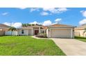 Charming single-Gathering home featuring a well-maintained lawn and two car garage at 3787 Sandhill Crane Dr, Lakeland, FL 33811