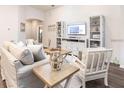 Inviting living room with comfortable seating, stylish decor, and ample natural light at 1859 Daystar Dr, Haines City, FL 33844