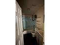 Bathroom features a shower and tub combo, a white toilet, and a vanity at 2921 Galaxy Ln, Lakeland, FL 33801