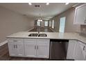 Eat-in kitchen with granite countertops, stainless steel appliances, and modern cabinets at 4042 Old Bartow Eagle Lake Rd, Bartow, FL 33830