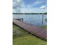 Picturesque wooden dock over the water offering a serene waterfront view at 1216 W Lake Buckeye Dr, Winter Haven, FL 33881