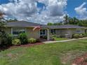 Inviting home exterior with a neatly landscaped yard and a welcoming entryway at 1232 Fairlee St, Lakeland, FL 33813