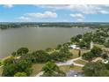 Aerial view of a lakefront property showing its location on a body of water at 21 Lake Ave, Winter Haven, FL 33880