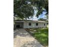 Charming one-story home with a well-maintained lawn and covered parking at 29 Coleman Rd, Winter Haven, FL 33880