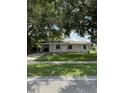 Charming one-story home with a well-maintained lawn and covered parking at 29 Coleman Rd, Winter Haven, FL 33880