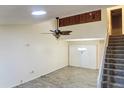 Bright living room with vaulted ceilings, ceiling fan, and sliding glass doors offers comfort at 925 Fenton Ln # 18, Lakeland, FL 33809