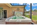 Outdoor hot tub perfect for relaxation with a beautiful outdoor view at 2932 Blackwater Oaks Dr, Mulberry, FL 33860