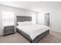 Cozy bedroom with plush carpeting, and a serene ambiance at 3167 Laurel Oak Ln, Winter Haven, FL 33884