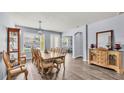 Spacious dining room featuring wood-look floors and ample natural light at 2472 Tahoe Dr, Lakeland, FL 33805