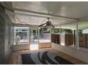 This screened porch provides a view of the outdoor kitchen area at 508 Garden N Dr, Lakeland, FL 33813