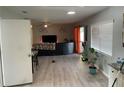 Open living room featuring modern furnishings, light gray paint, and plenty of space at 105 Byron Pl, Winter Haven, FL 33884