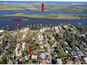 Wide aerial view of the property at 1312 2nd Street close to the Indian River and New Smyrna Beach at 1312 2Nd St, Edgewater, FL 32132
