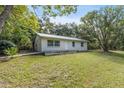 Newly renovated home with metal roof and spacious yard at 4660 Holly Rd, New Smyrna Beach, FL 32168