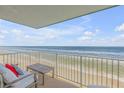 Ocean view balcony with patio furniture at 5203 S Atlantic Ave # 814B, New Smyrna Beach, FL 32169