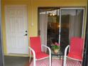 Inviting patio area with outdoor seating, perfect for enjoying the fresh air and relaxation at 116 Cedar Dunes Dr, New Smyrna Beach, FL 32169