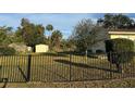 Large backyard with shed and fence at 109 Western Ave, Edgewater, FL 32132