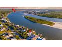 Aerial view of a house with water access near the South Causeway at 1324 N Peninsula Ave, New Smyrna Beach, FL 32169