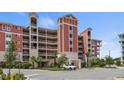 Upscale condo building exterior with parking at 2 Riverwalk Dr # 502, New Smyrna Beach, FL 32169