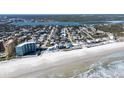 Aerial view of beach house near the ocean at 239 Kirkland Rd, New Smyrna Beach, FL 32169