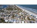 Aerial view showing home's location near the beach at 239 Kirkland Rd, New Smyrna Beach, FL 32169