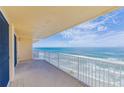 Relaxing balcony with breathtaking ocean views and white railings at 3145 S Atlantic Ave # 804, Daytona Beach Shores, FL 32118