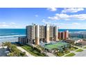 Oceanfront building with tennis courts and parking at 4139 S Atlantic Ave # A307, New Smyrna Beach, FL 32169