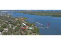 Bird's eye view of waterfront property and community at 417 N Riverside Dr, Edgewater, FL 32132