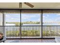 Spacious screened balcony overlooking waterfront at 460 Bouchelle Dr # 304, New Smyrna Beach, FL 32169