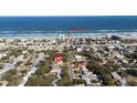 Aerial view showing home's proximity to the beach at 826 E 12Th Ave, New Smyrna Beach, FL 32169