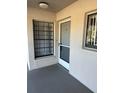 Condo building entry with screen door at 1036 Bonaire Dr # 2832, Altamonte Springs, FL 32714