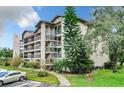 Condo building exterior, showcasing landscaping at 1036 Bonaire Dr # 2832, Altamonte Springs, FL 32714