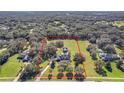 Aerial view of property showing large lot size and surrounding homes at 182 Kentucky Blue Cir, Apopka, FL 32712