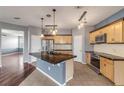 Modern kitchen with granite countertops and stainless steel appliances at 2707 Atlantis Dr, New Smyrna Beach, FL 32168