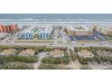 Aerial view showing condo community near the beach at 4150 S Atlantic Ave # 112C, New Smyrna Beach, FL 32169