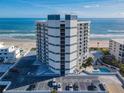 Oceanfront building, parking and pool; stunning ocean view at 5207 S Atlantic Ave # 423, New Smyrna Beach, FL 32169